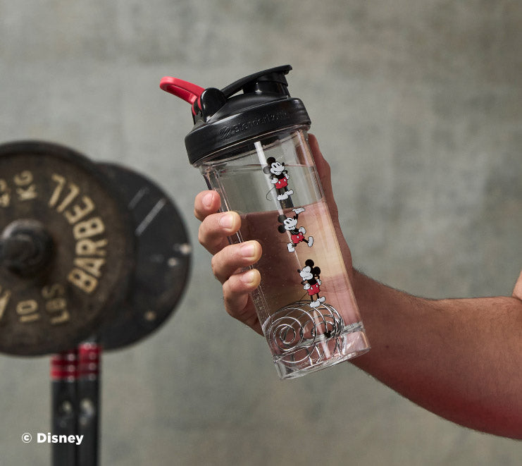 pro-series-x9 Mickey_Mouse_Protein_Shaker_Bottle_Being_Held_In_the_Gym.jpg